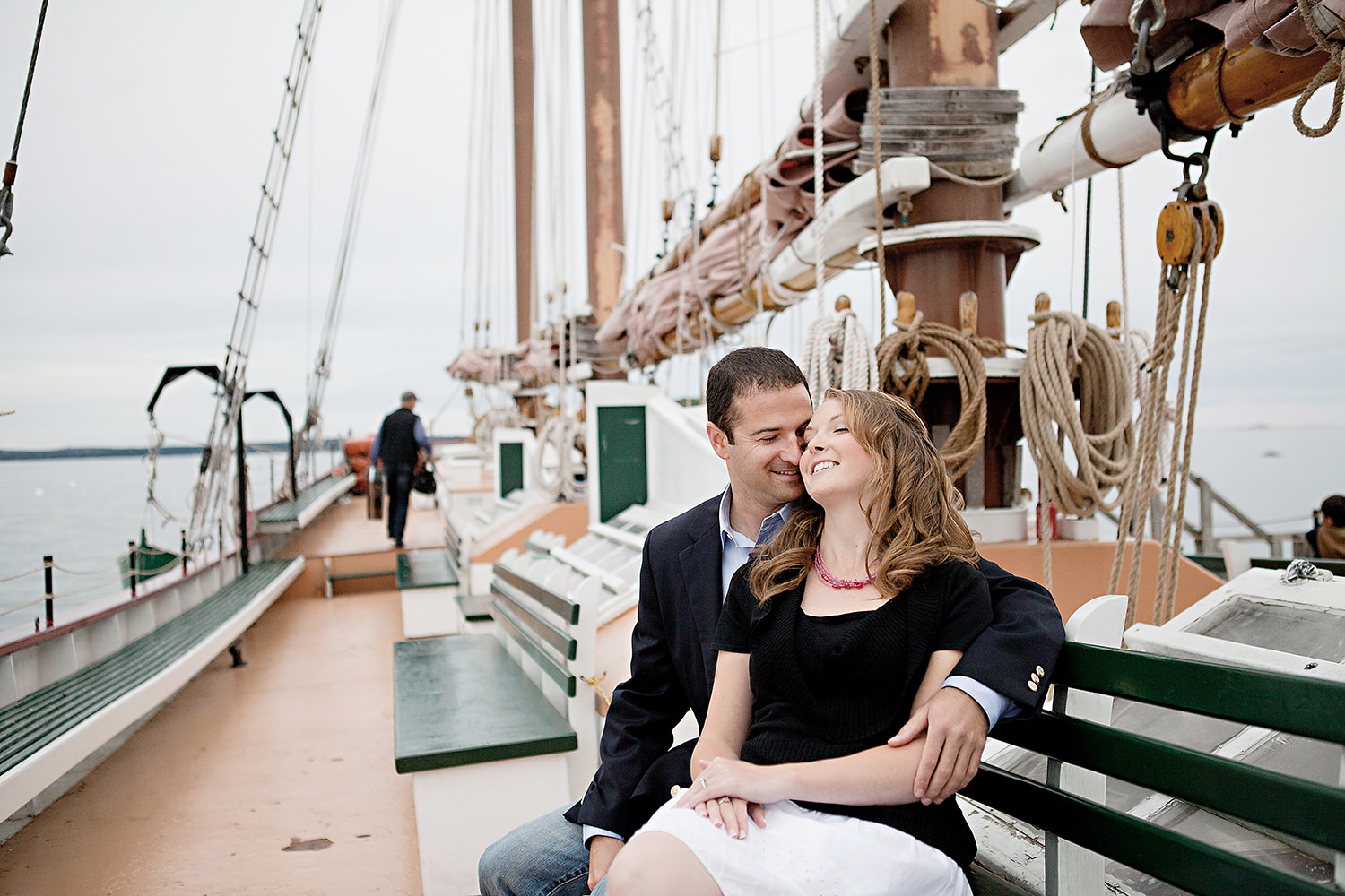 couple aboard the Margaret Todd during during engagement photos in Bar Harbor