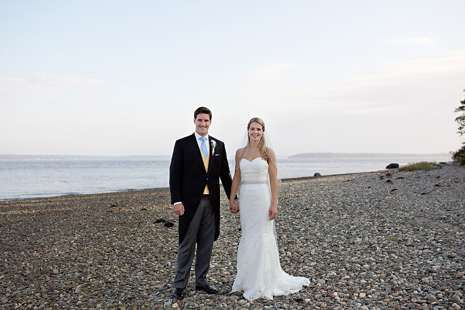 Bride and groom on beach at French's Point wedding