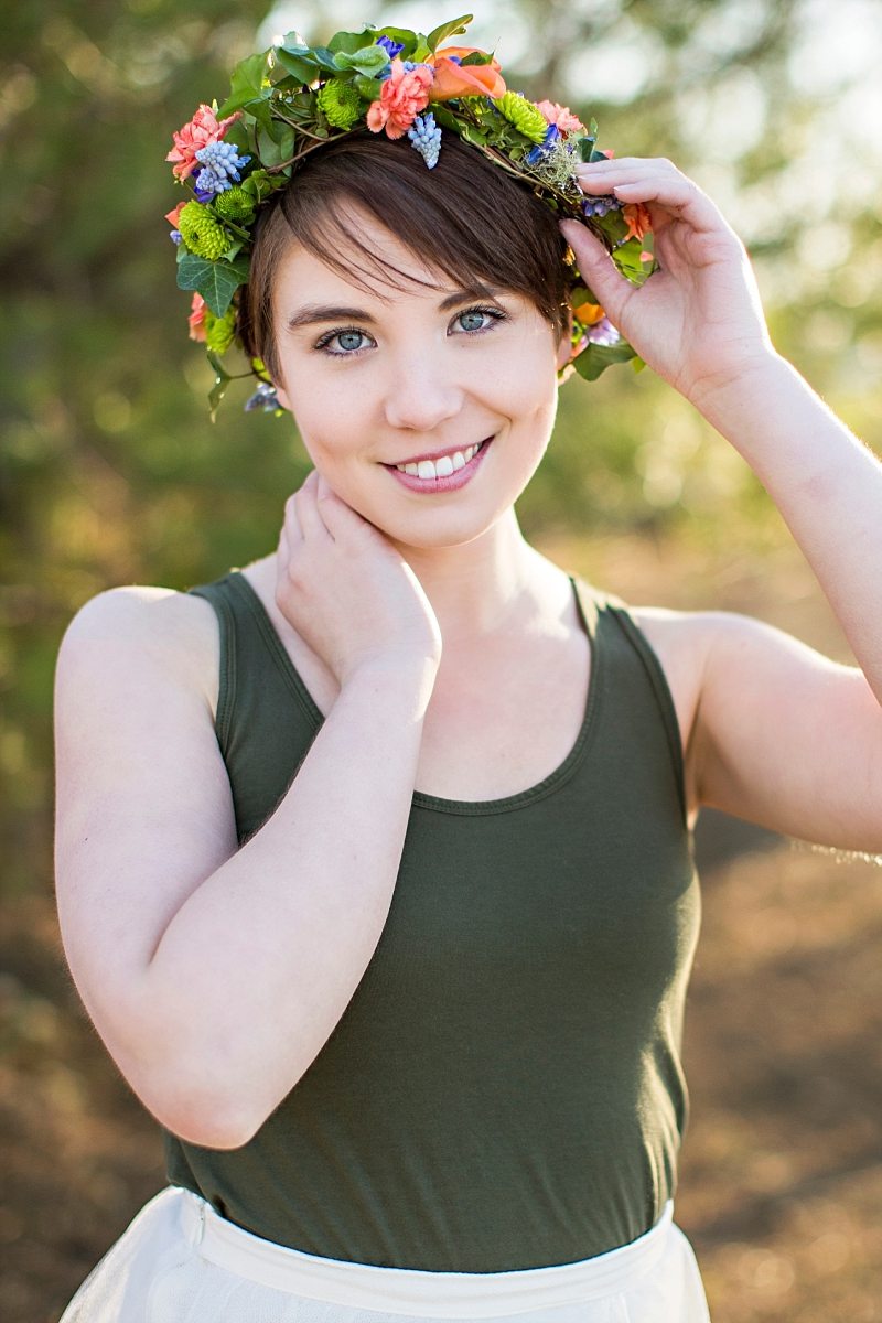 A portrait of a girl wearing a flower crown.