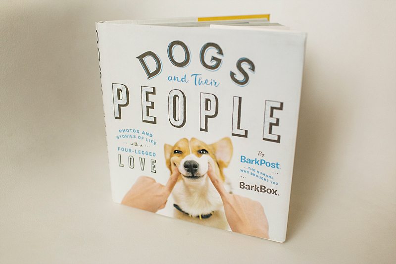 A photo of the book "Dogs and Their People."