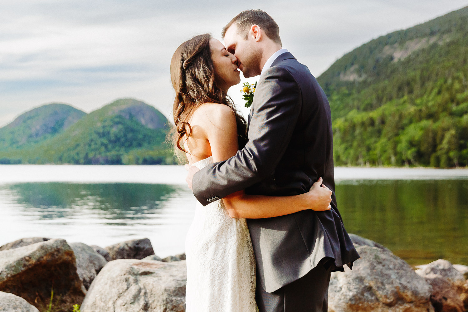 First kiss during elopement at Jordan Pond in Acadia National Park