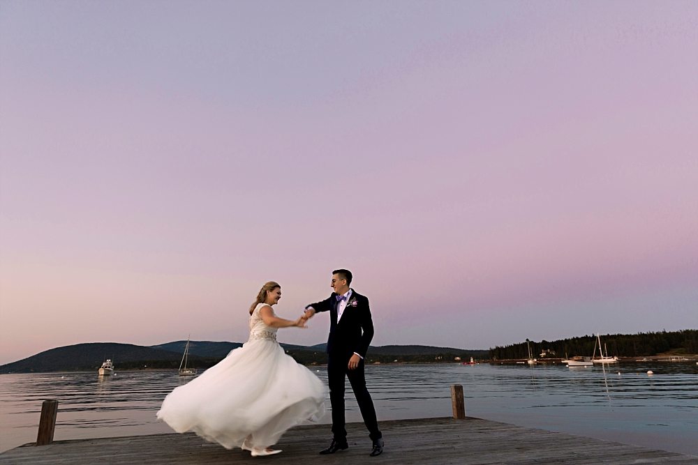 bride and groom dancing at sunset at their Claremont Hotel Southwest Harbor wedding