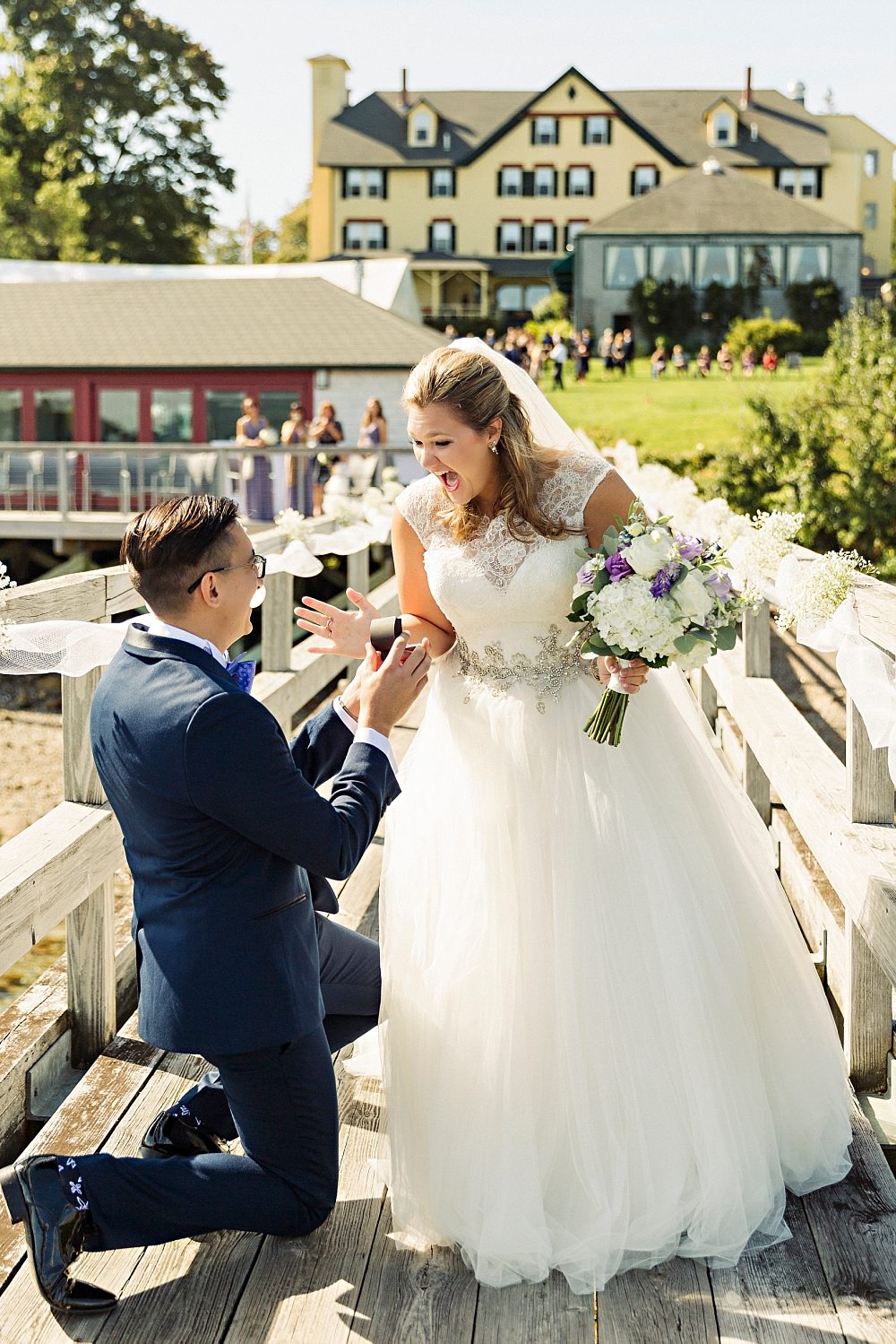groom presents bride with a new ring at Claremont Hotel Southwest Harbor wedding