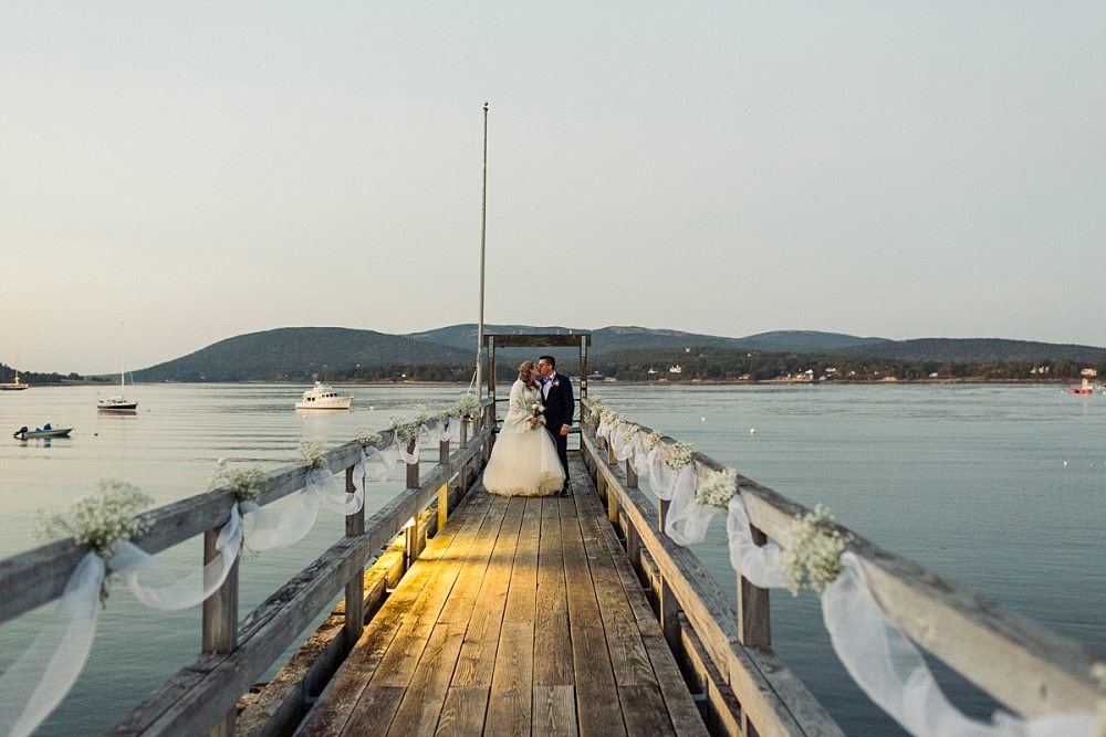 couple on dock at Claremont Hotel Southwest Harbor wedding