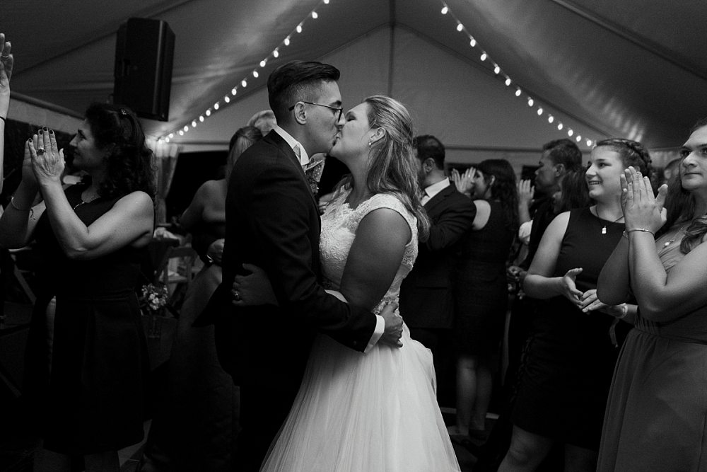 bride and groom kissing at Claremont Hotel Southwest Harbor wedding reception