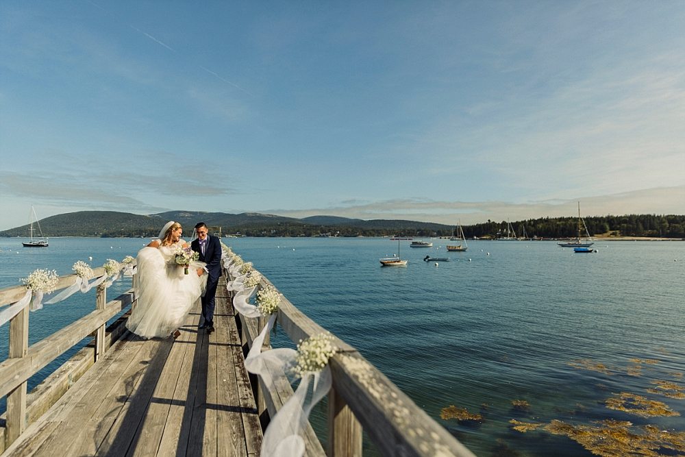 bride and groom on dock at Claremont Hotel Southwest Harbor wedding