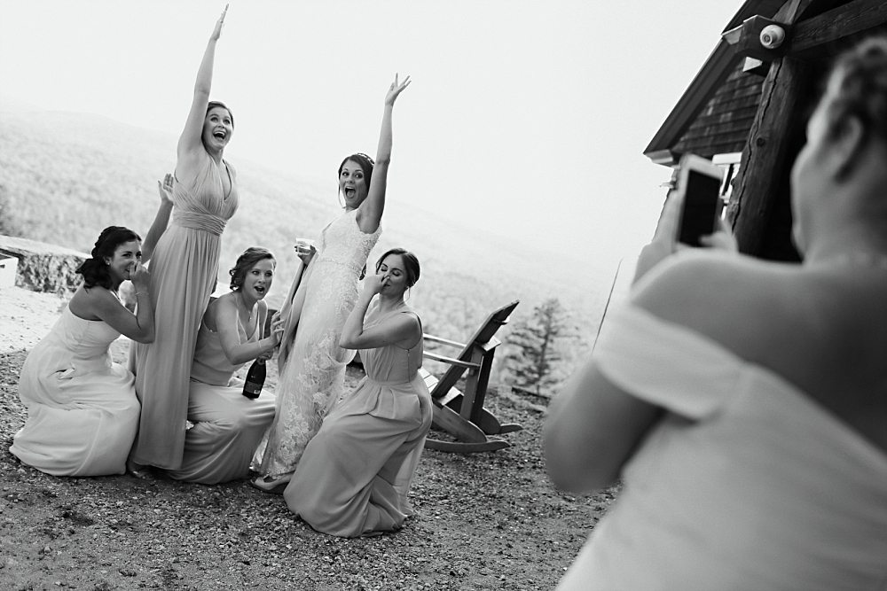 Bride and bridesmaids doing a boomerang during wedding at Granite Ridge Estate & Barn