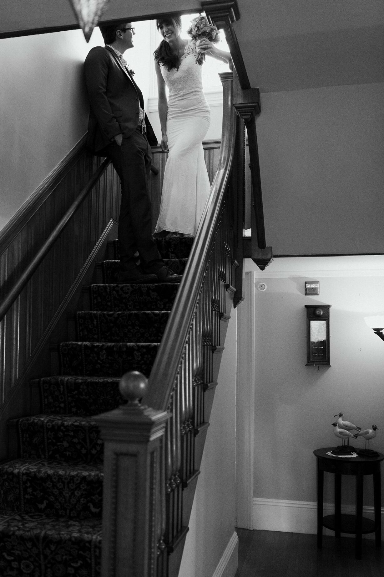 bride and groom coming down the stairs during Bar Harbor elopement
