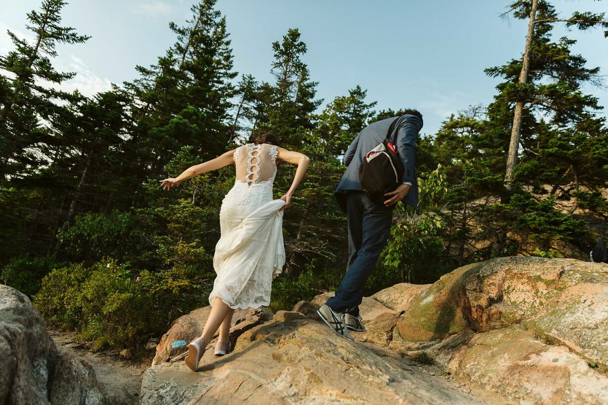 Newlyweds hiking in Acadia National Park