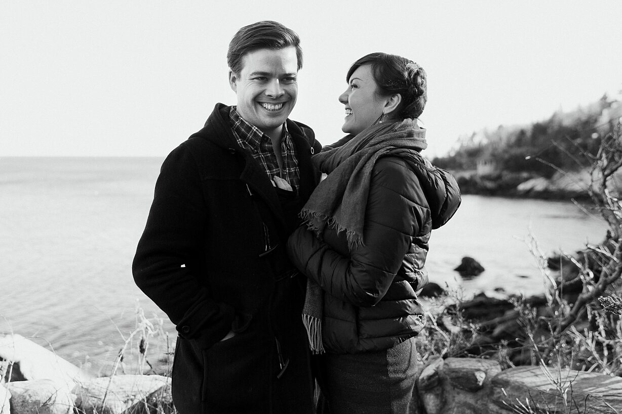 Black and white photo of couple laughing