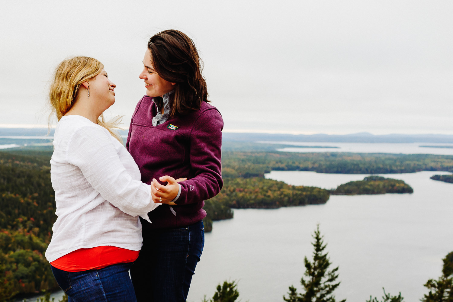 Two happy women after Acadia National Park Proposal at Beech Mountain