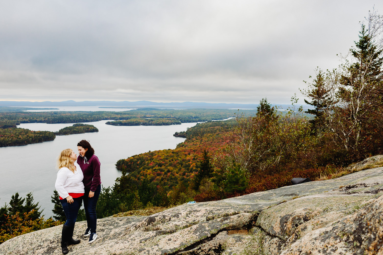 scenic shot of two women on Beech Mountain in Acadia National Park