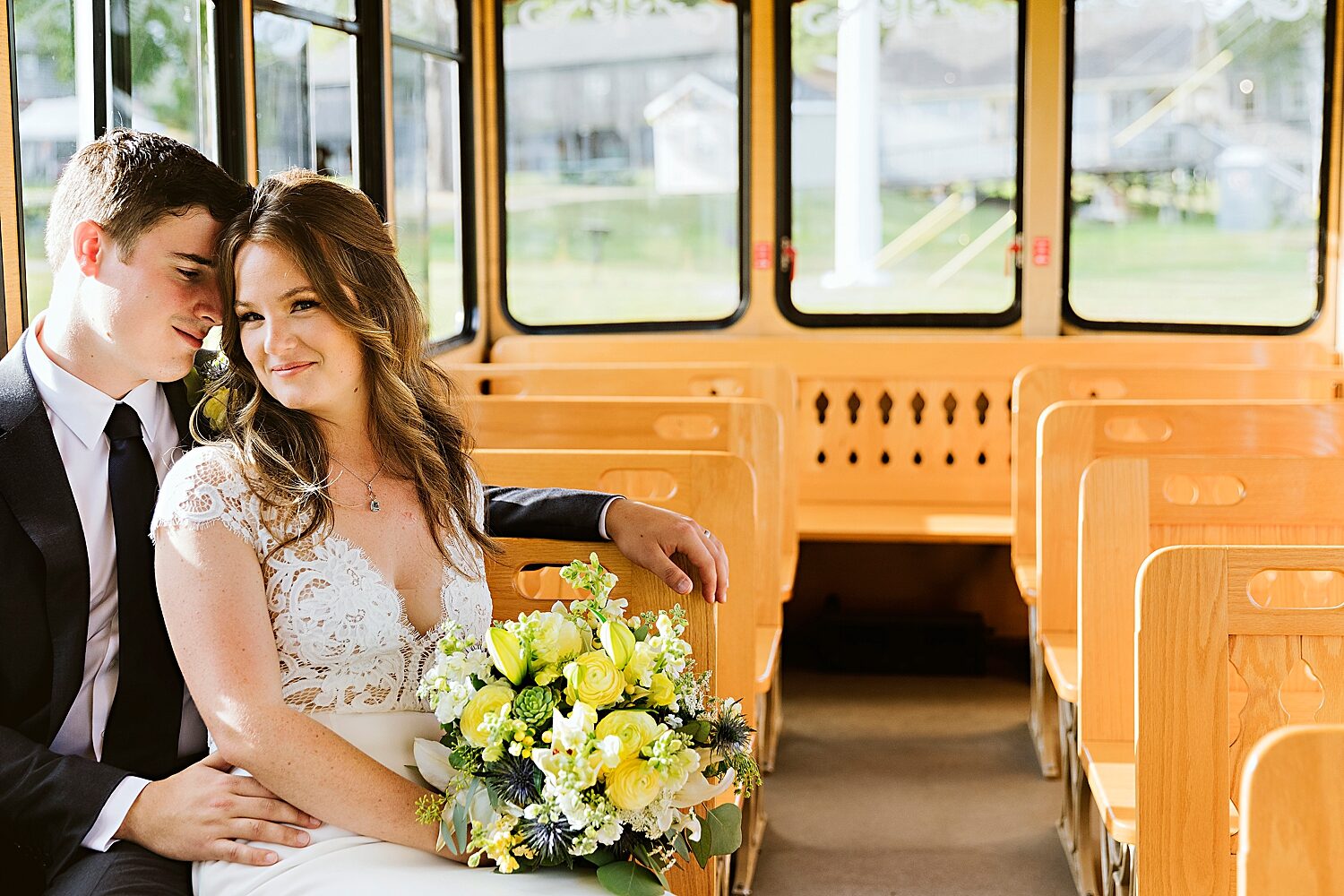 Bride and groom on a trolley