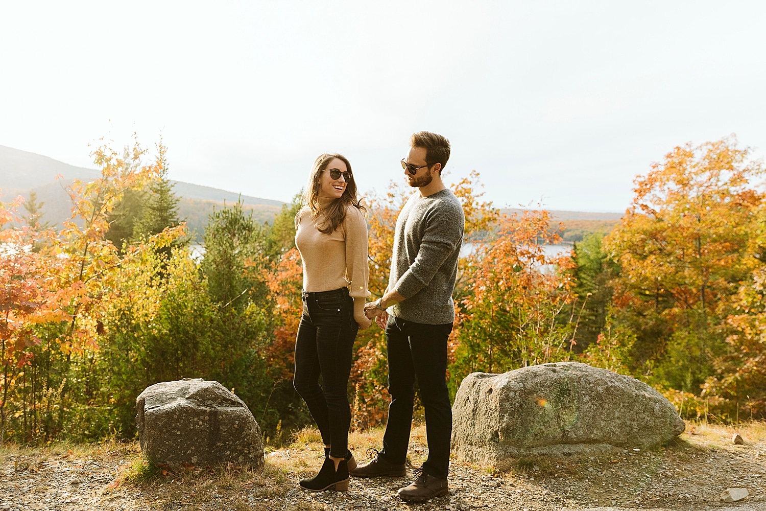 couple with fall foliage in Acadia National Park