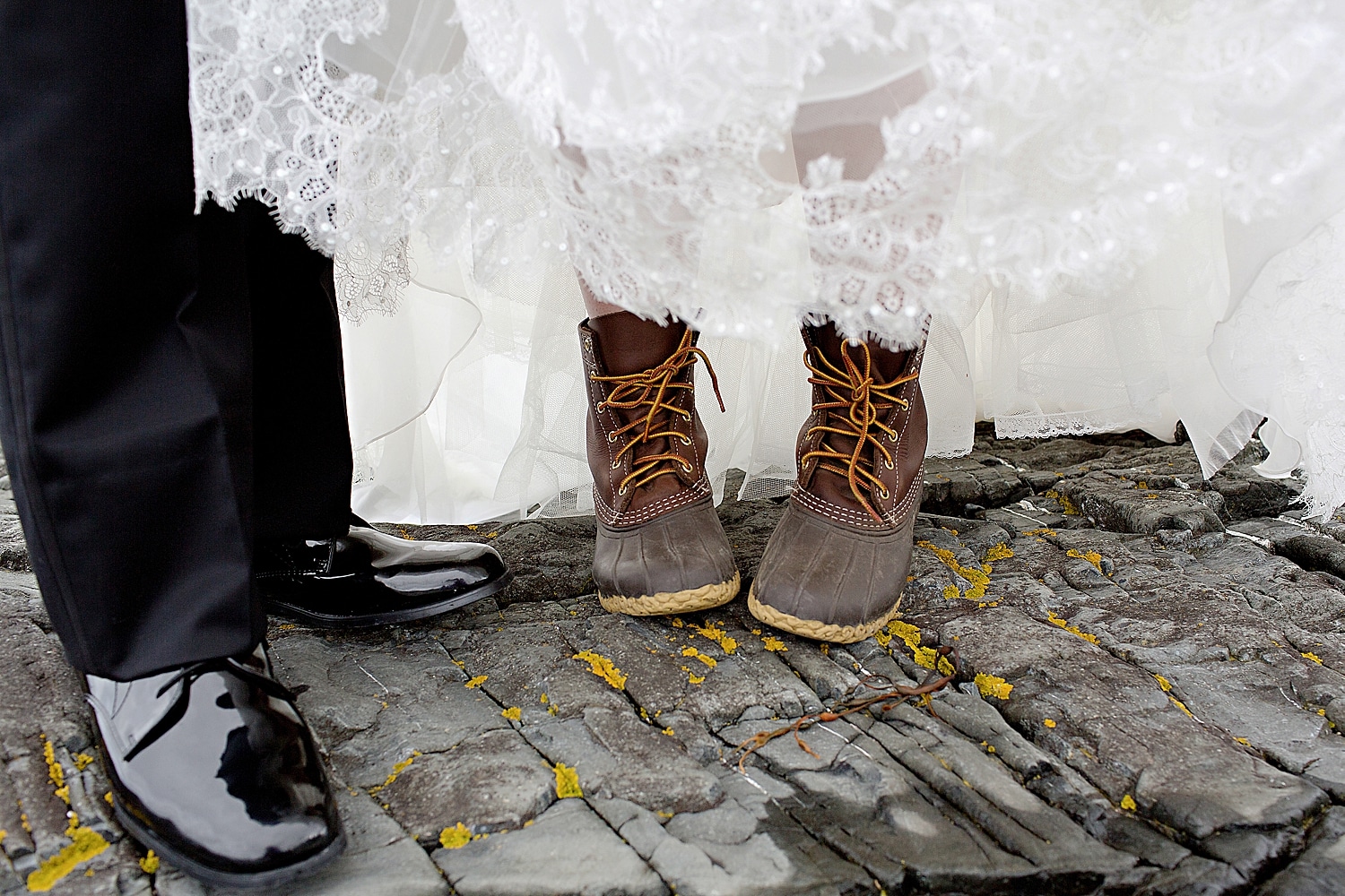 Bean boots on rocky coast at Great Cranberry Island Maine wedding