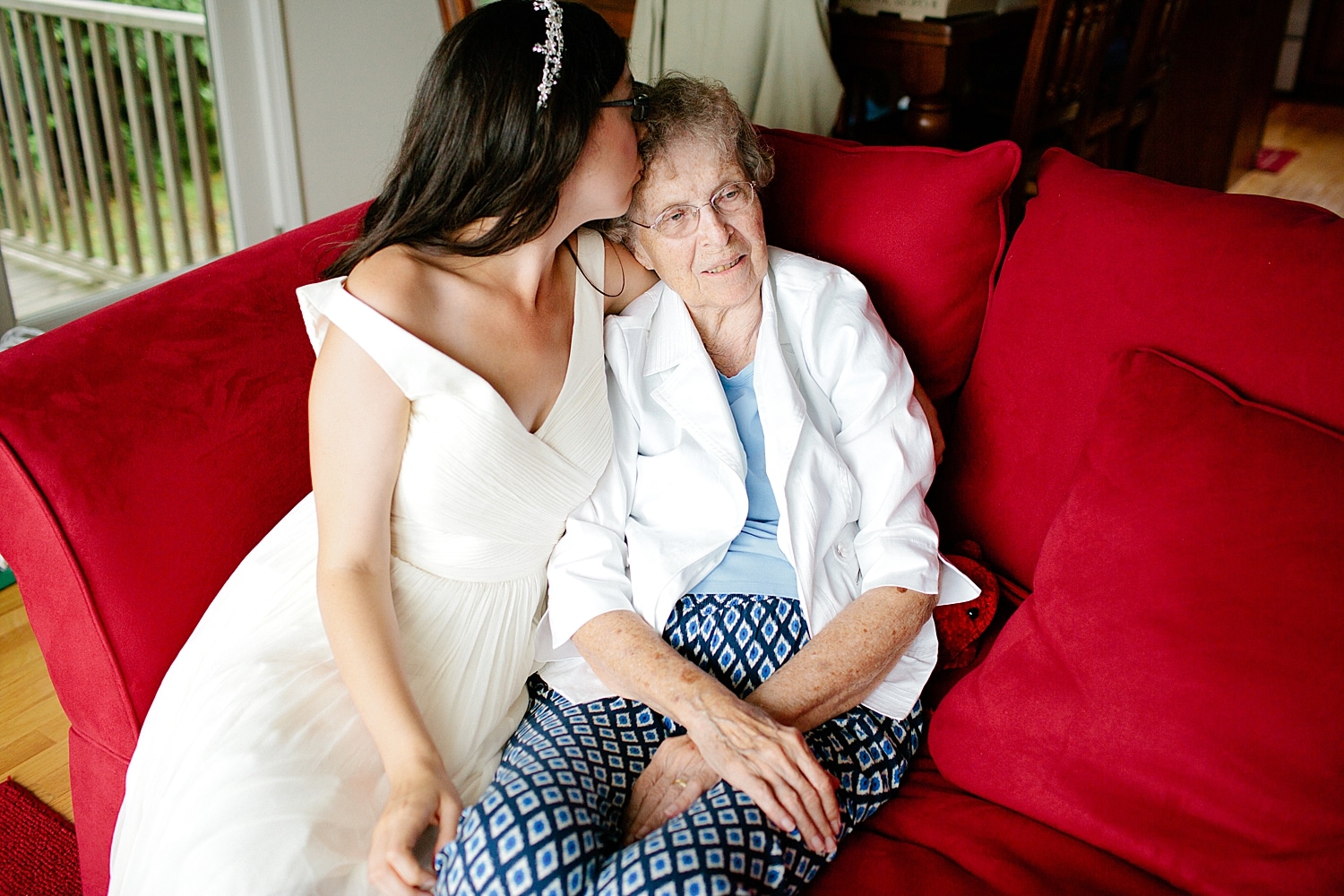 Bride kissing her grandmother at Prospect Harbor Maine wedding