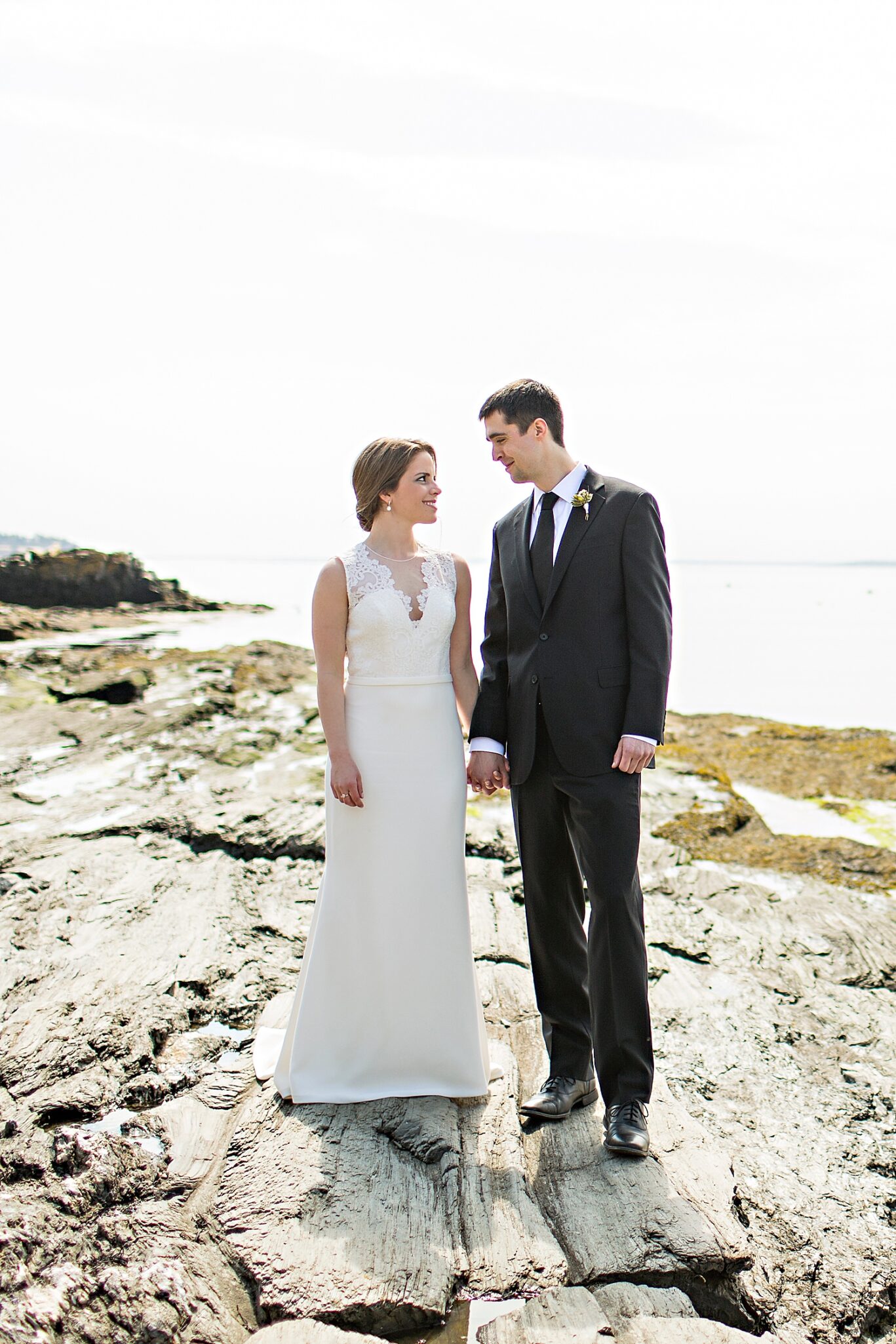 Bride and groom at Kettle Cove before Portland Maine city hall wedding