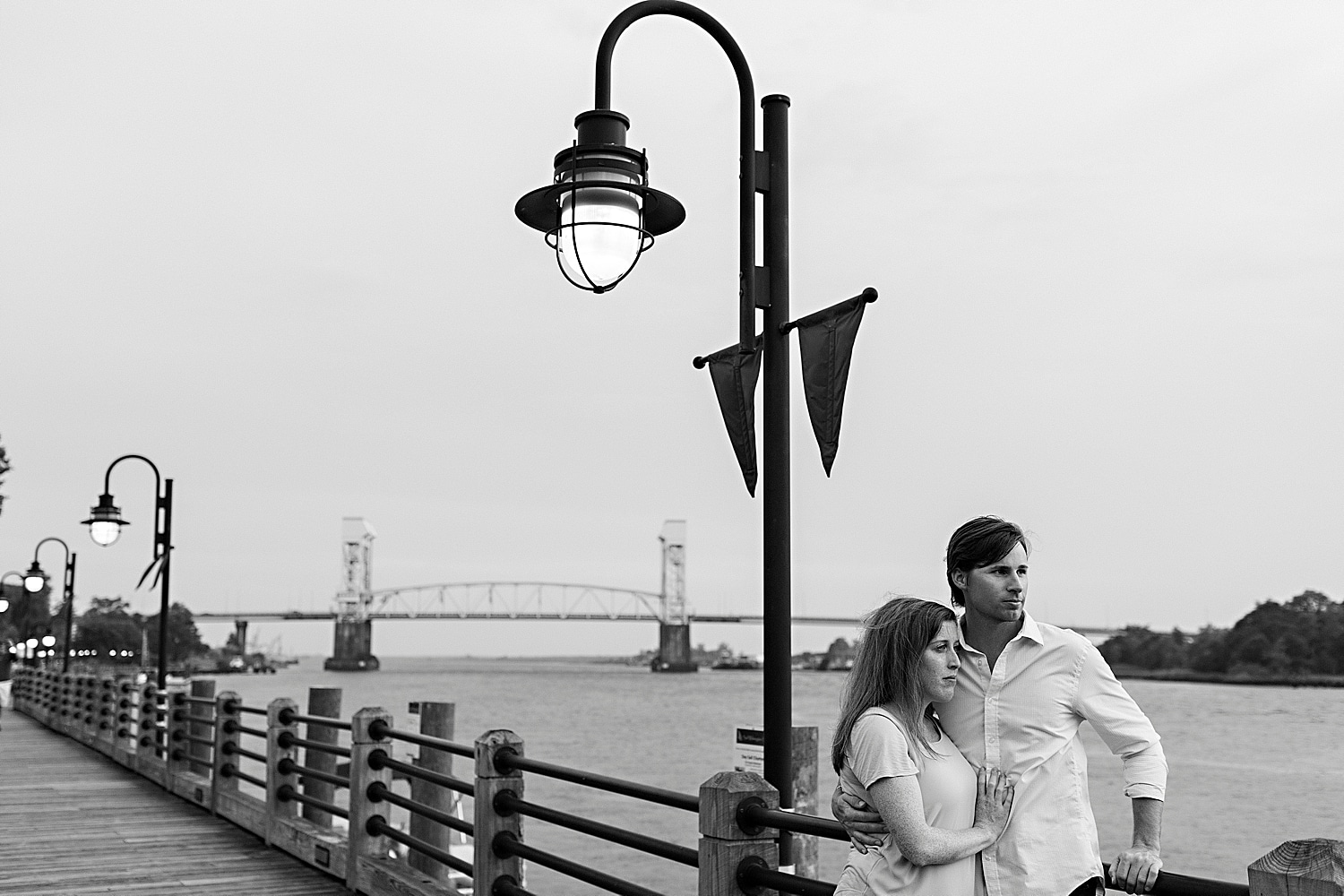 couples portraits in Wilmington North Carolina in front of bridge