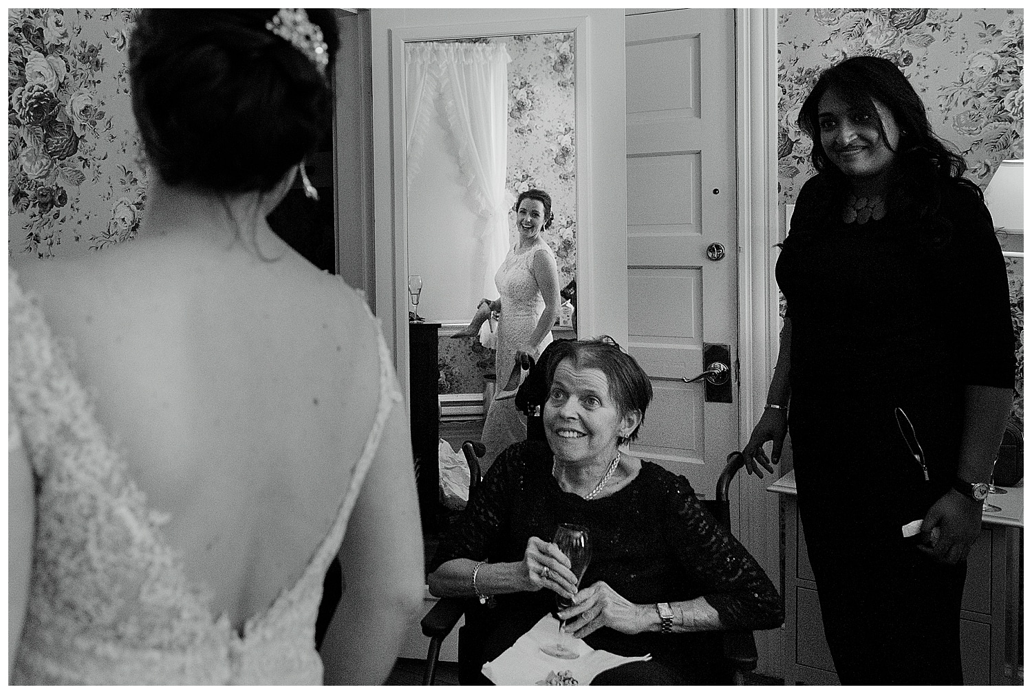 bride's mom sees her in wedding dress for the first time at Kennebunkport Maine wedding