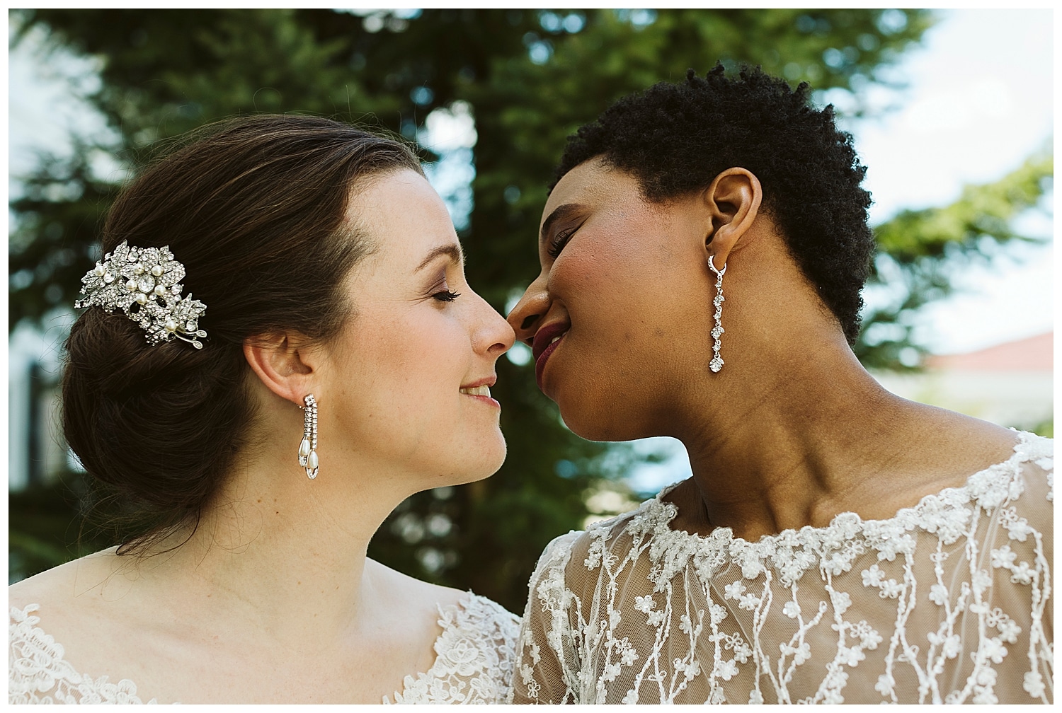 two brides about to kiss at Kennebunkport Maine wedding at The Colony Hotel