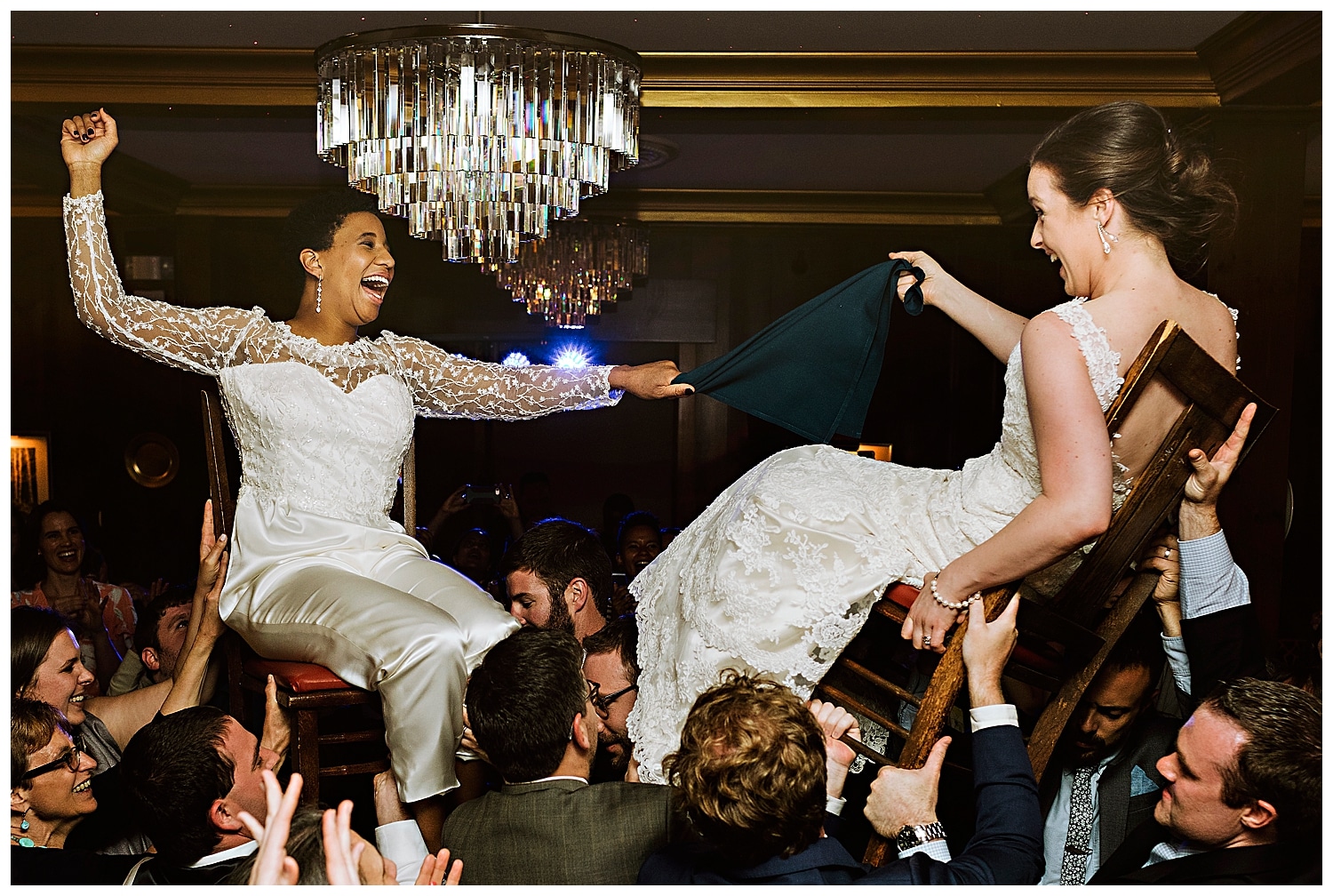 two brides during hora at Kennebunkport Maine wedding at The Colony Hotel