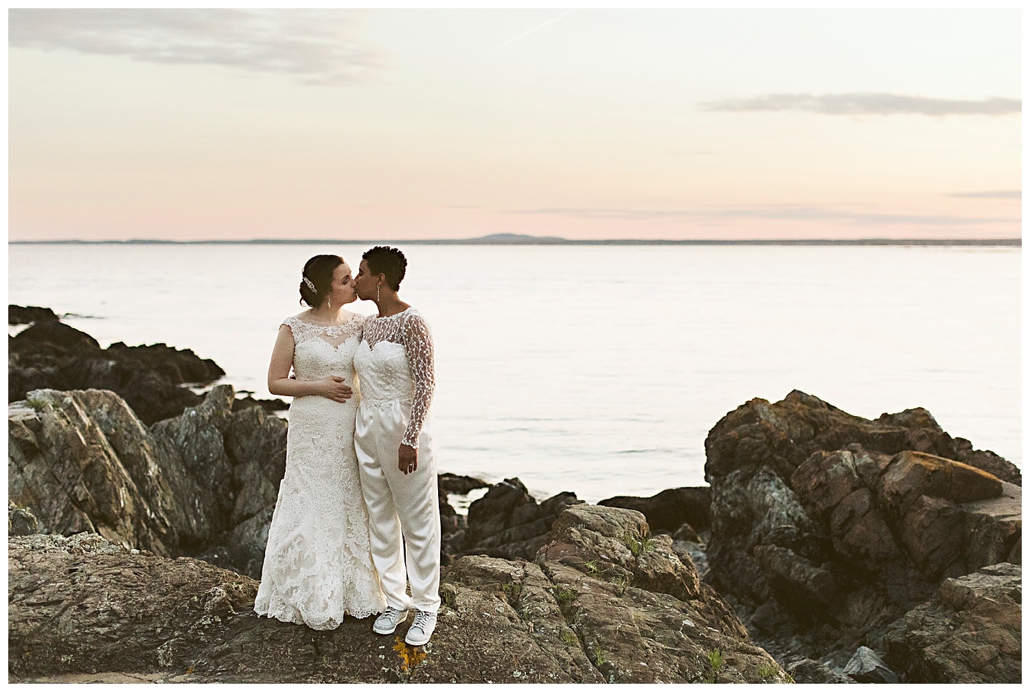 two brides at sunset during Kennebunkport Maine wedding at The Colony Hotel