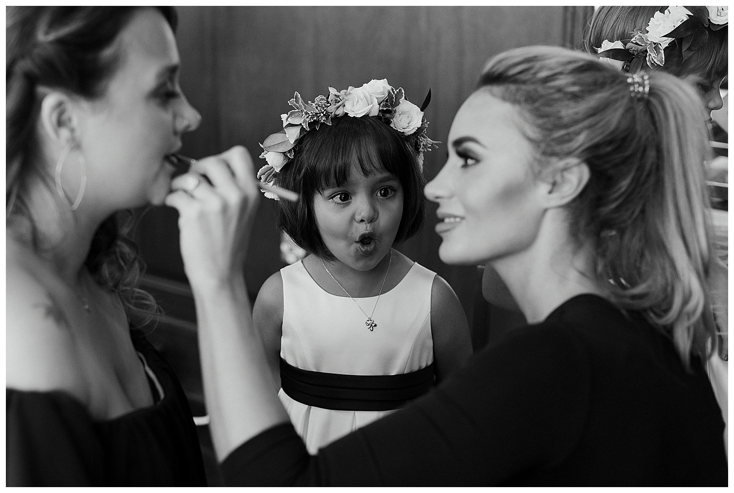 flower girl wowed by makeup artist at Northport Maine wedding