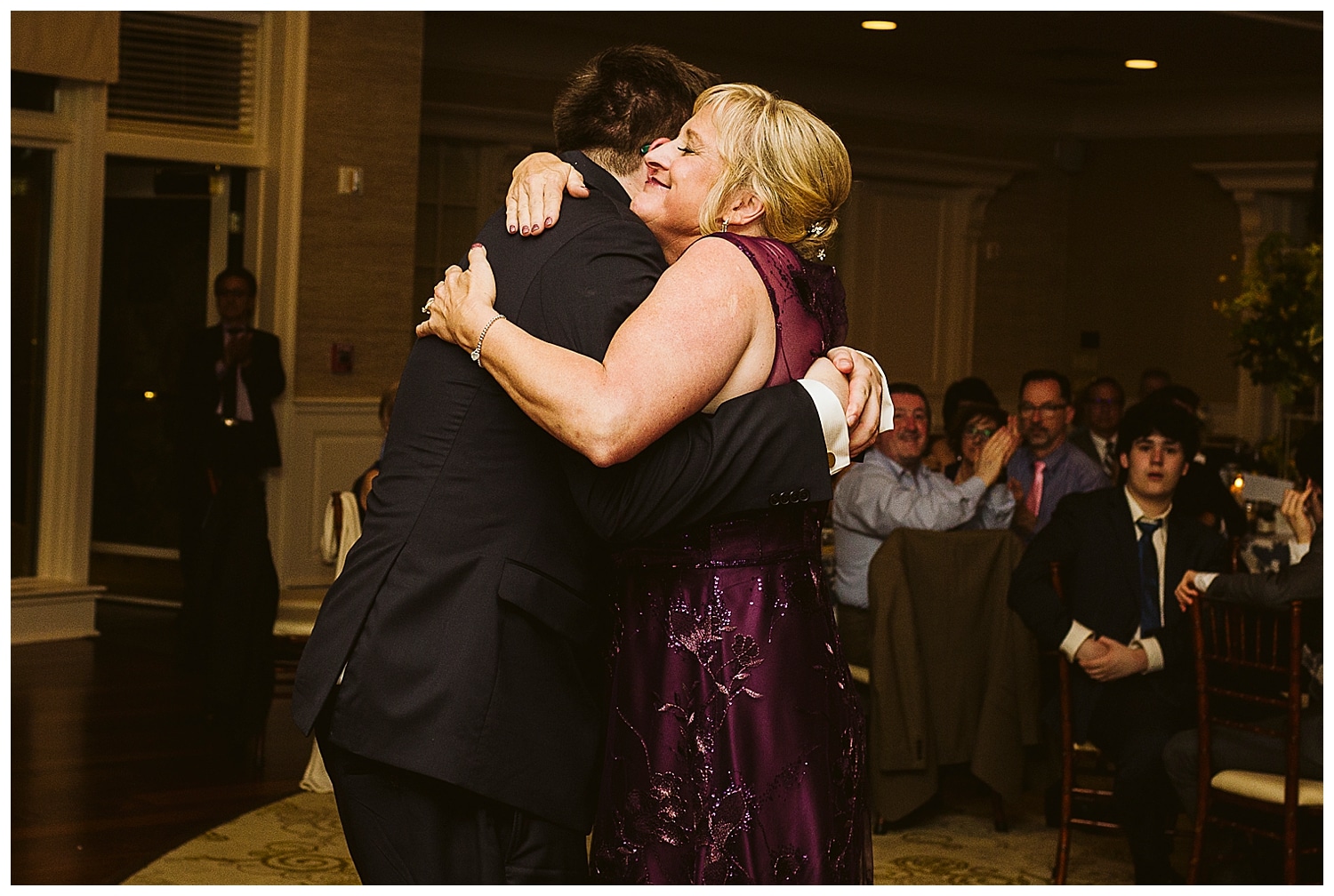 Groom dancing with mother at Northport Maine wedding