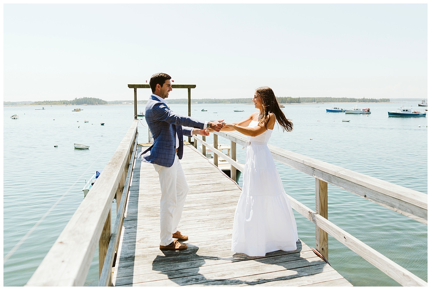 bride and groom dancing on a dock at little cranberry island maine wedding