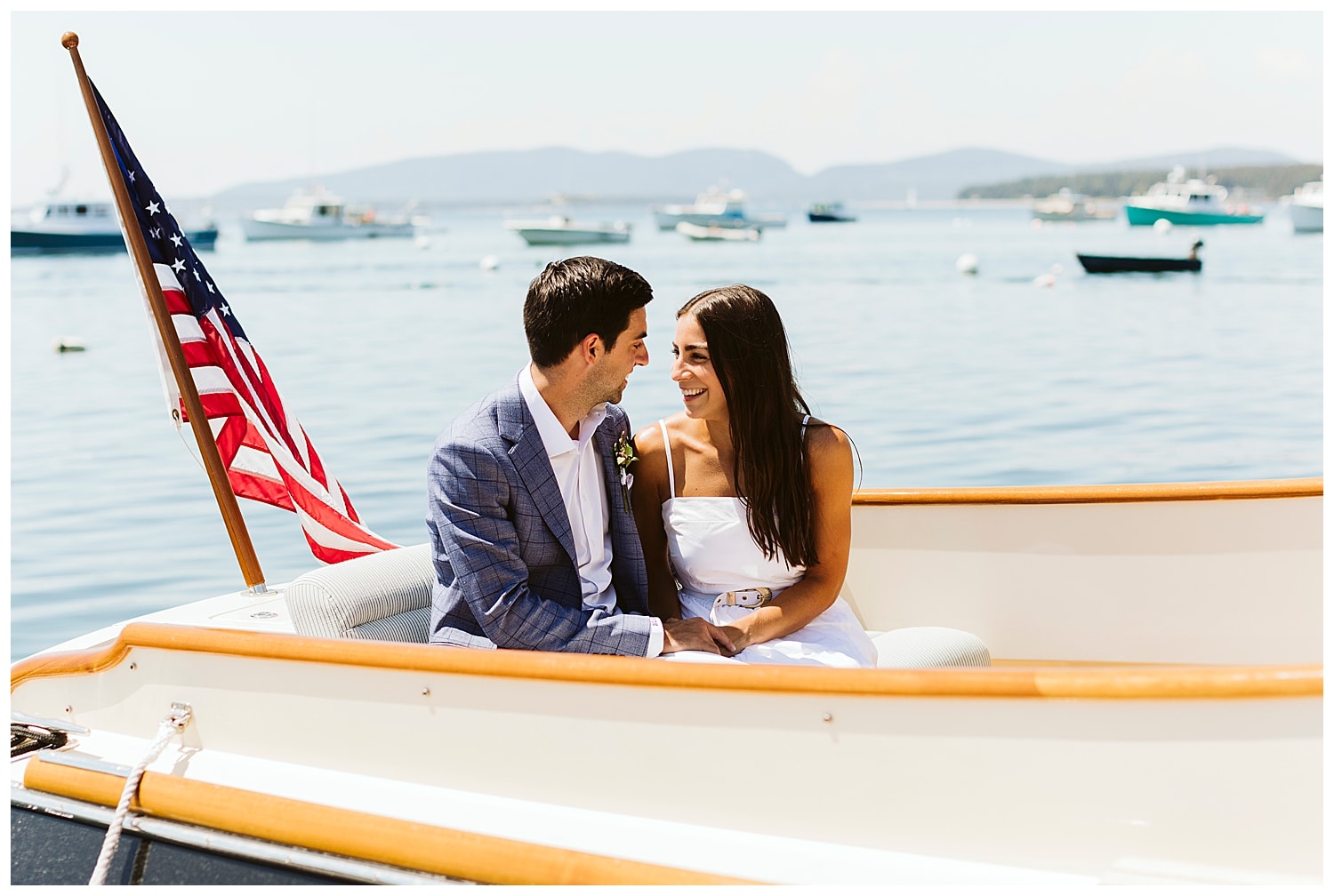 bride and groom together in a boat