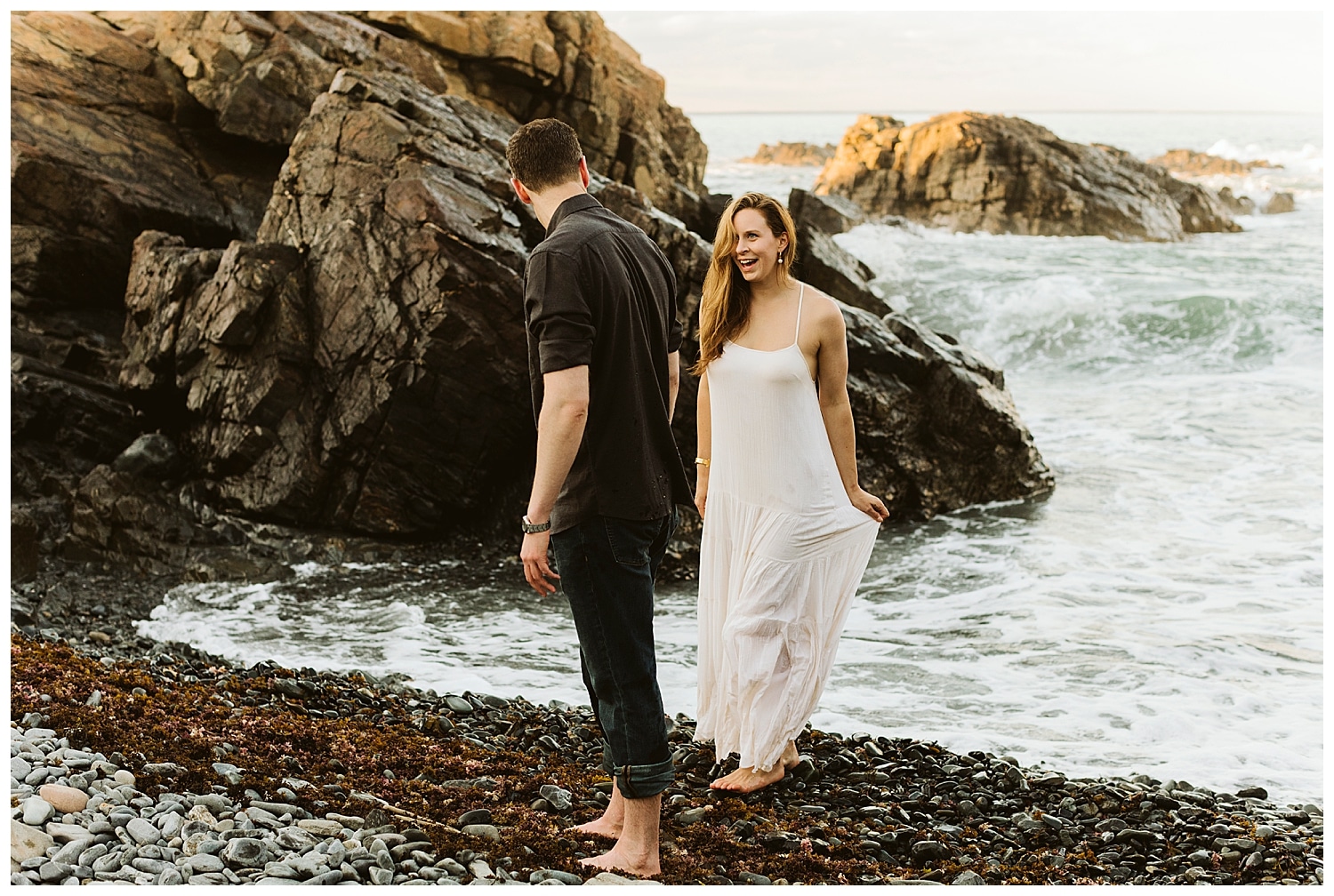 couple walking out of ocean during Ogunquit Maine engagement photos