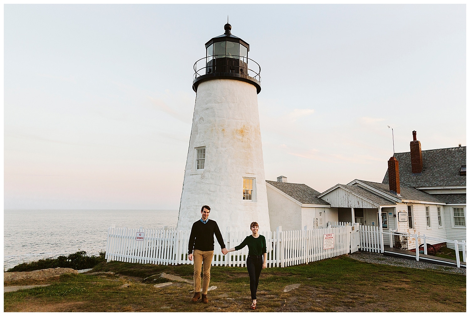 couple in front of Pemaquid Point Lighthouse at sunset