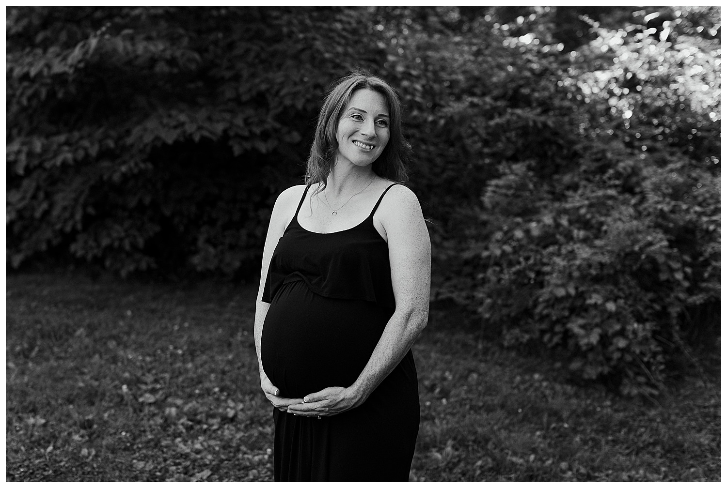expectant mother during maternity photos at University of Maine
