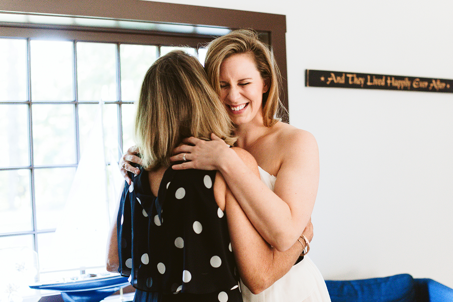 bride hugging her mother during  micro wedding in Kennebunkport Maine