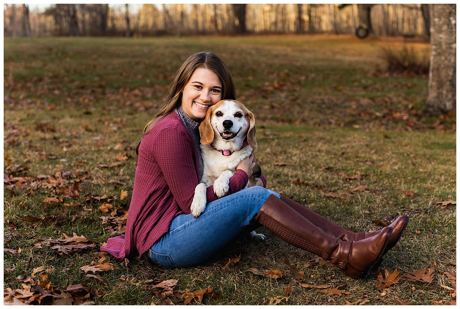 woman holding her beagle