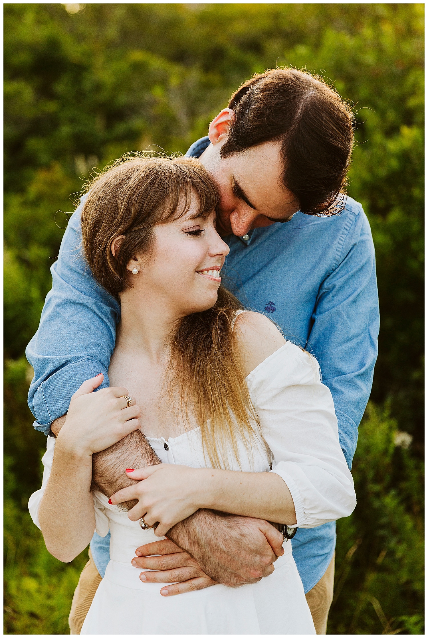 couple embracing during Bristol, Maine engagement photos