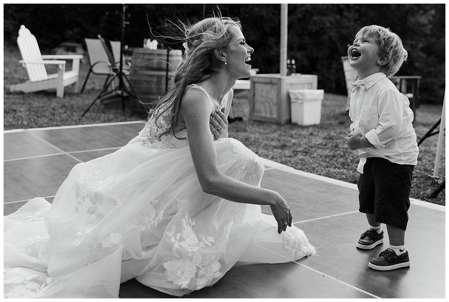 bride laughs with her son during NH wedding