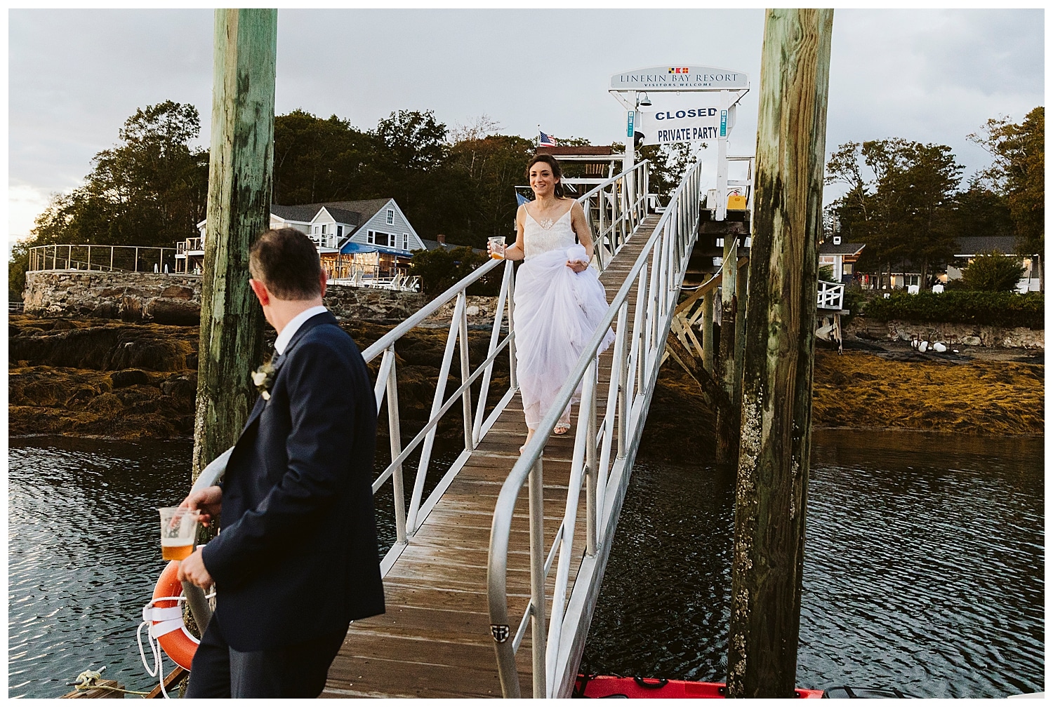 couple on dock during Linekin Bay Resort wedding