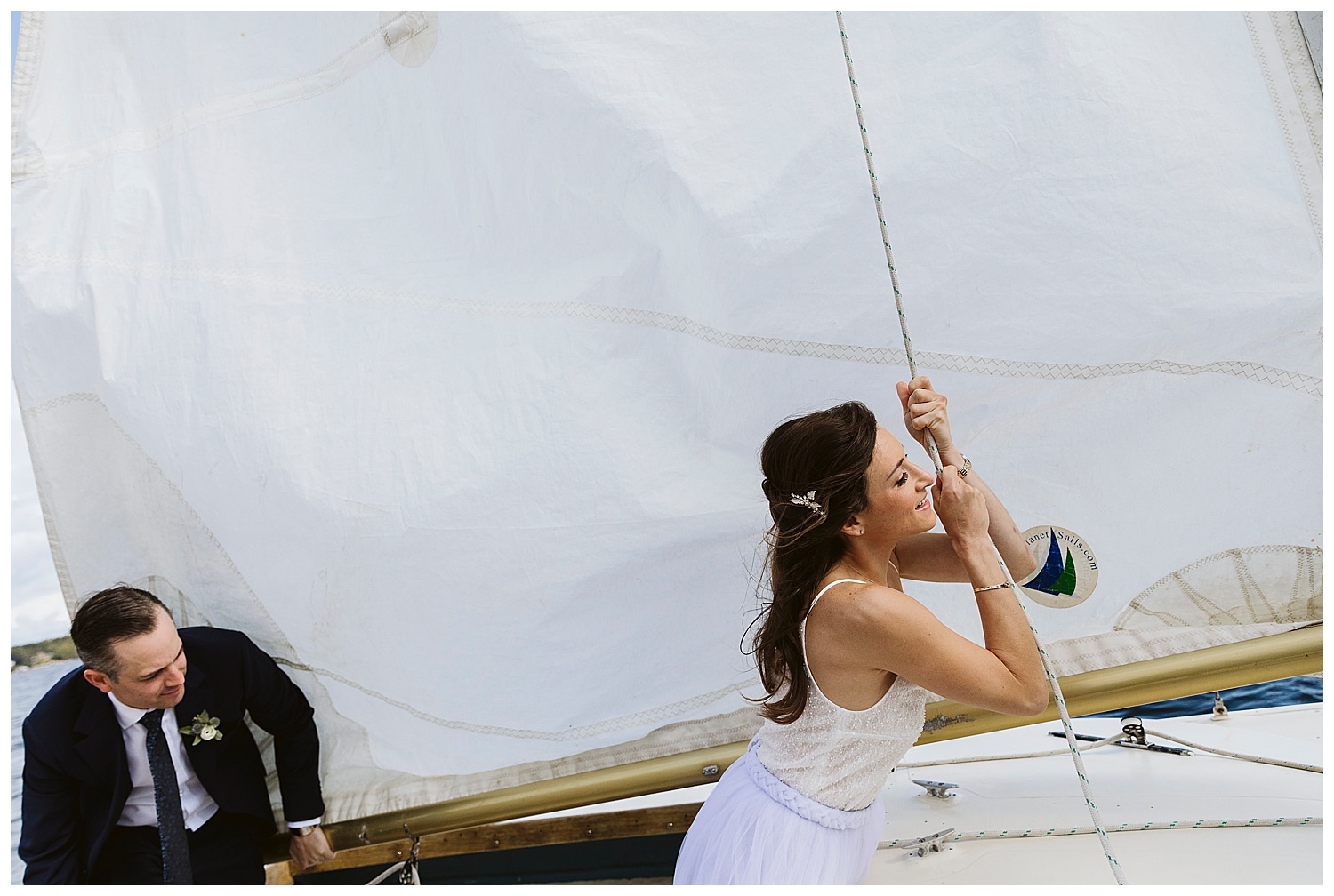 bride raising the sails at Linekin Bay Resort wedding