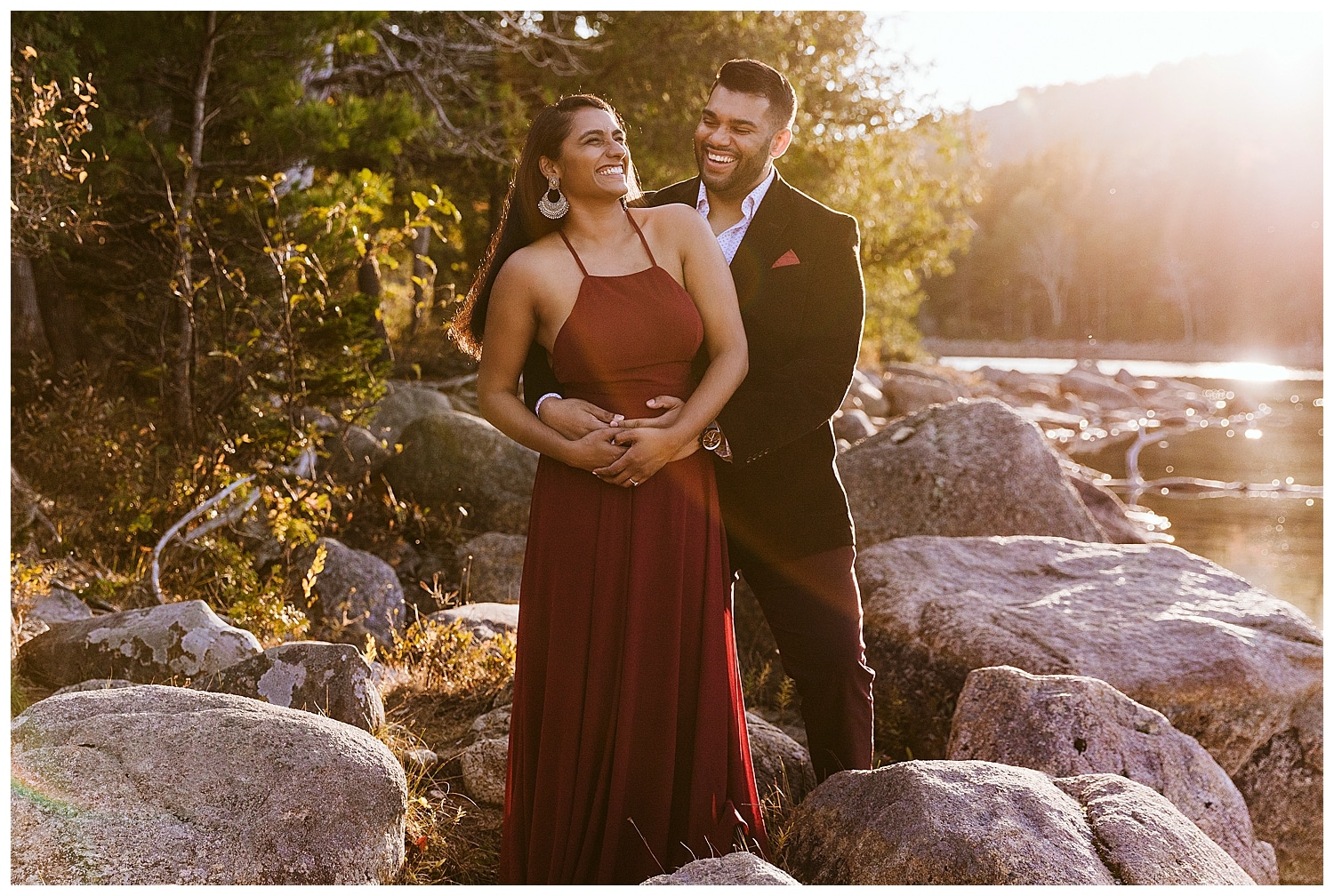 couple laughing in the sun at Jordan Pond during Otter Point Acadia Engagement Photos