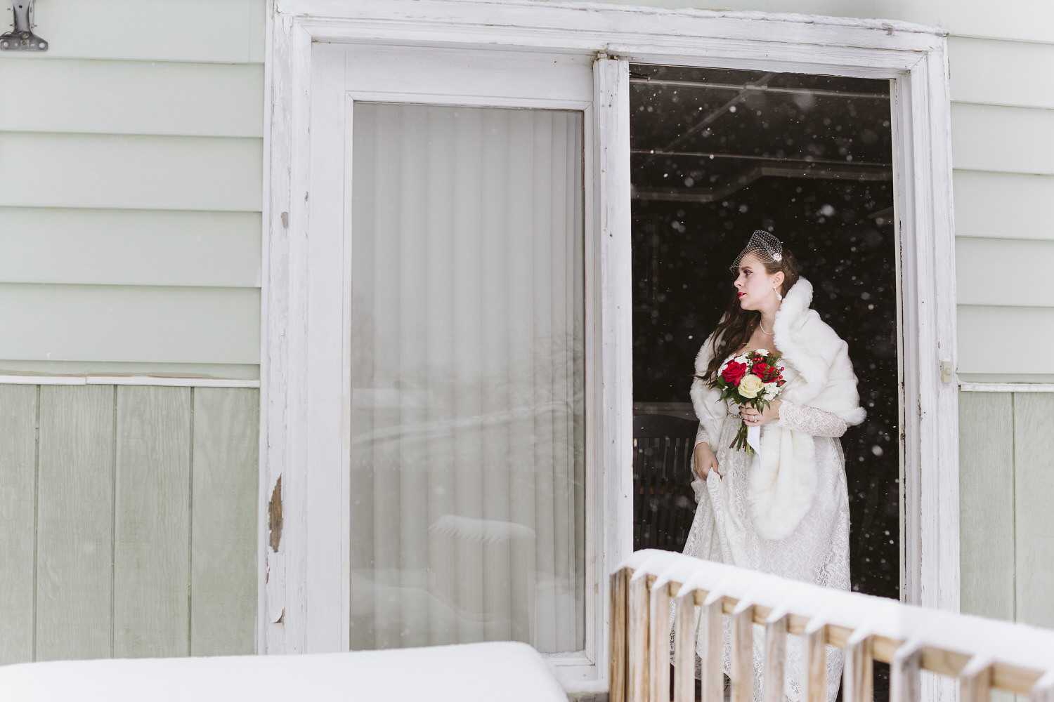 bride gets ready to leave for winter wedding in Millinocket Maine