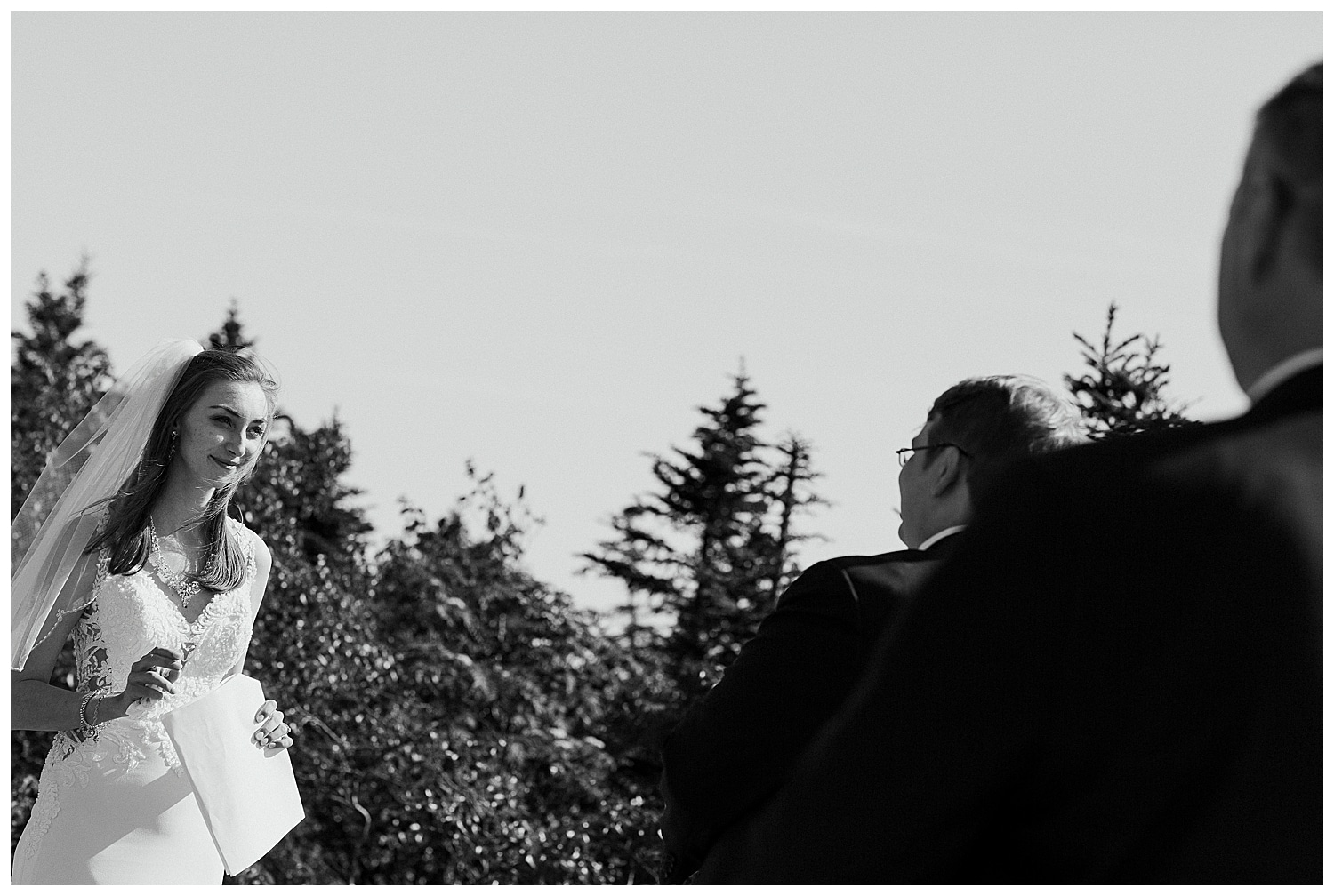 bride during elopement in Acadia National Park