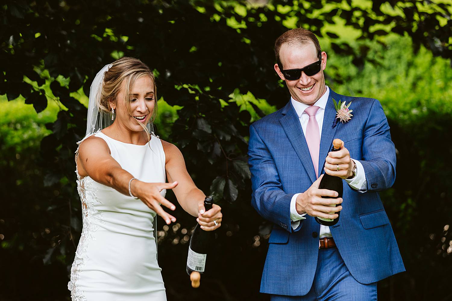 popping champagne at North Hampton, NH wedding