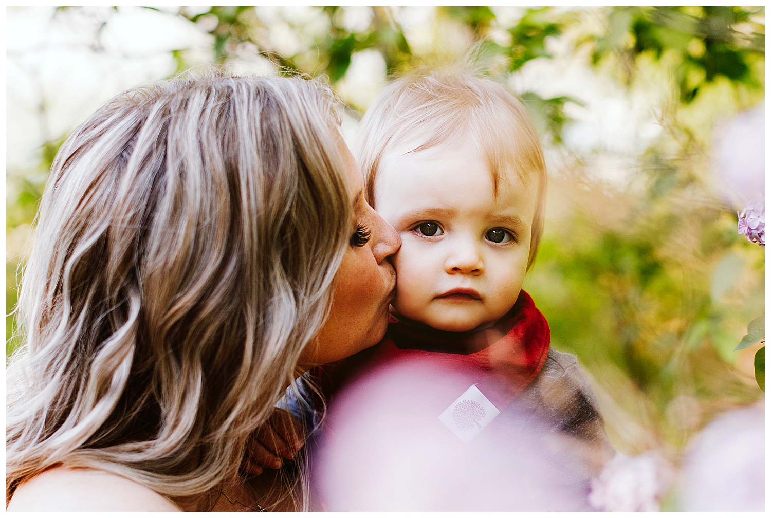 mother kissing son's face during portraits in Palermo, Maine