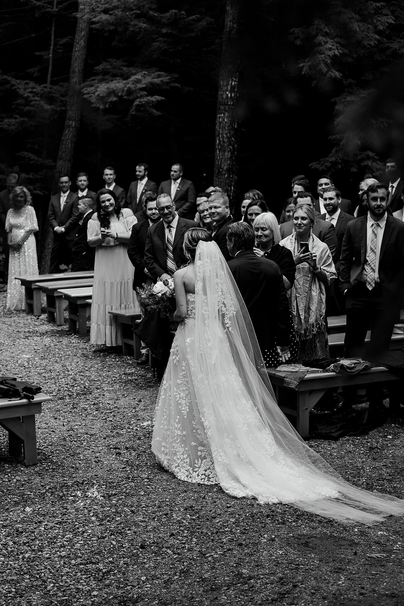 bride walking down the aisle with her father at Maine wedding