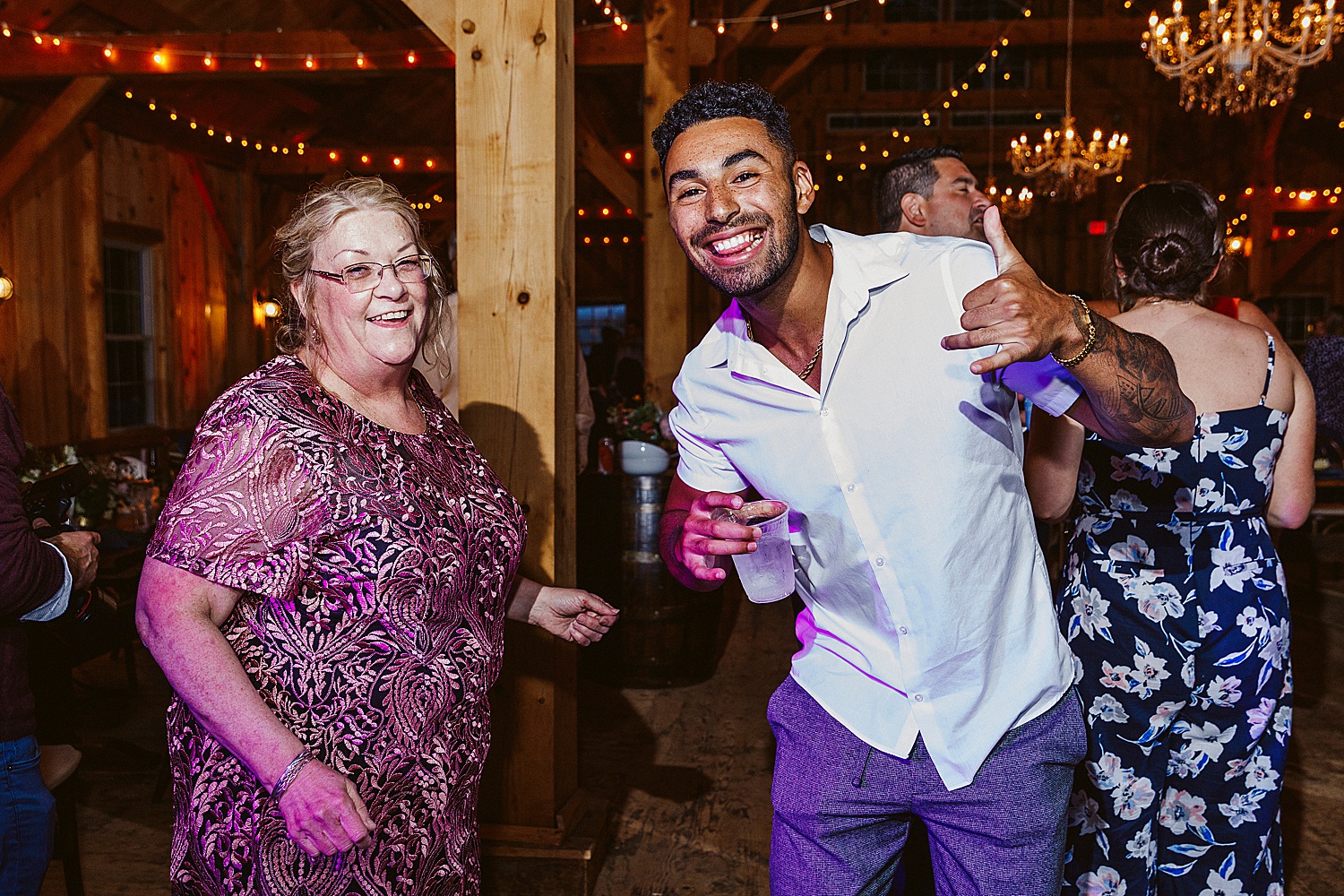 man dancing with mother of the groom