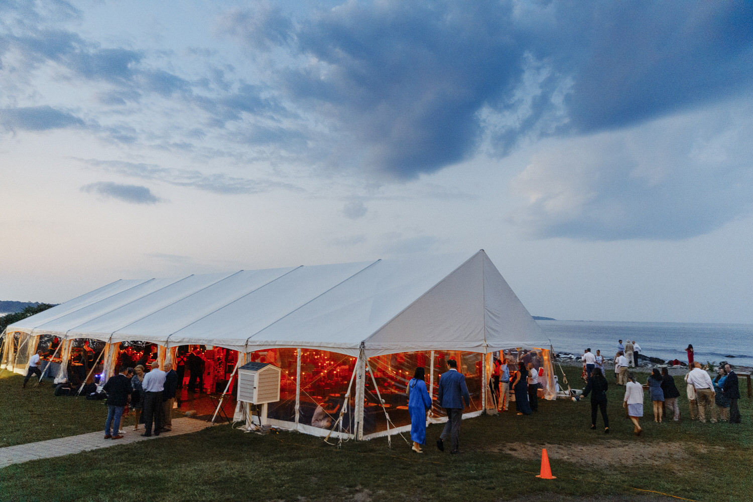 sunset over the reception tent at wedding at Seacoast Science Center