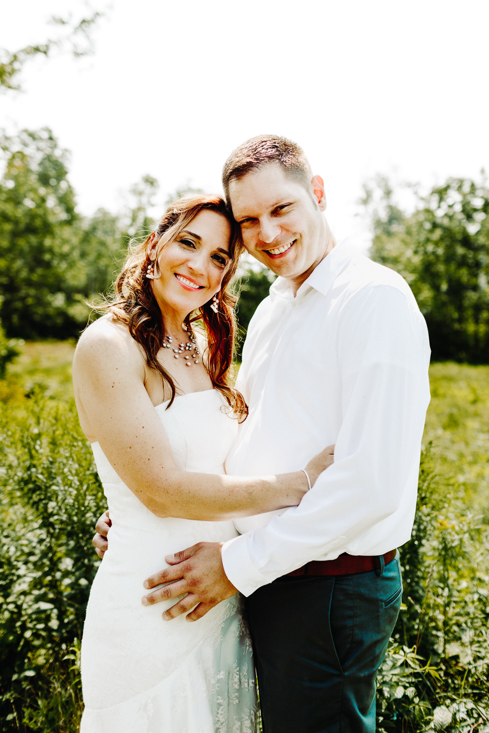 portrait of bride and groom at backyard wedding in Northport, Maine