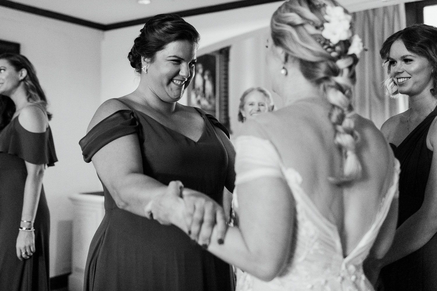 bride getting excited with bridesmaid