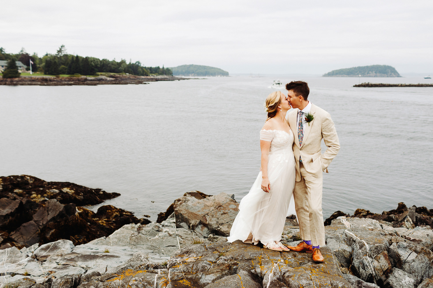 Bride and groom kissing in Bar Harbor